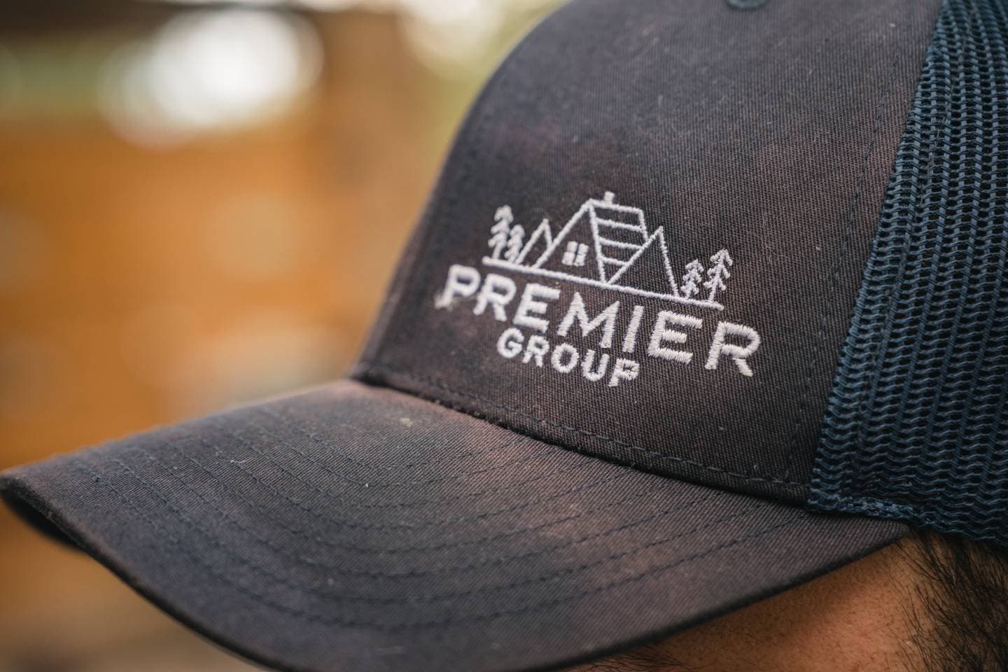A Premier Group cap, up close